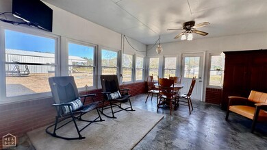 Windows wrap around all 3 walls.