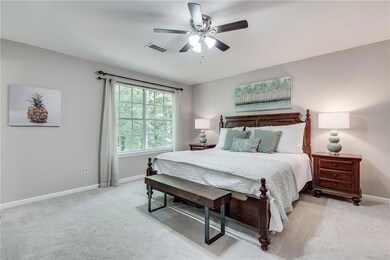 The upper level is highlighted by an oversized primary suite, which contains a walk-in closet and a renovated ensuite bathroom equipped with a tiled walk-in shower.
