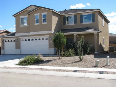 Front of home with 3 car garage