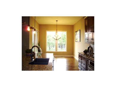 Sunny breakfast room adjoins kitchen.