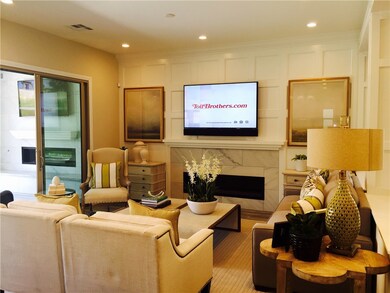 Photo is of the Delamar Model great room and is fo