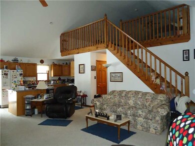 Exterior Front. Stairway to Loft