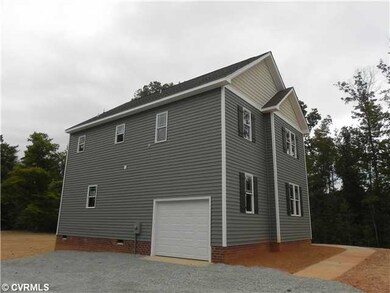 Exterior Front - Attached side entry garage.