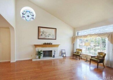 Vaulted ceiling accented by custom stained glass.