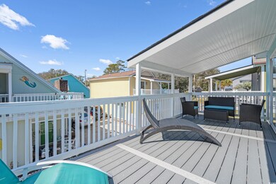 Wooden deck featuring an outdoor living space