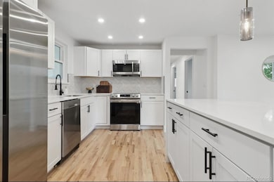 348 S Racine St, Aurora, CO 80012 - photo 4