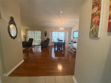 Tiled foyer and wood floors