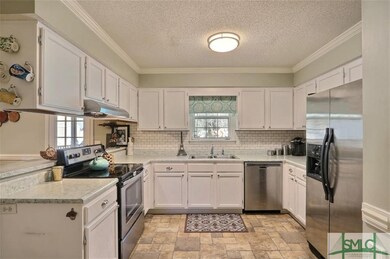 Painted White Cabinets and Stainless Appliances