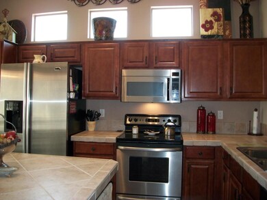 Cherry Maple cabinets & Tile Counters
