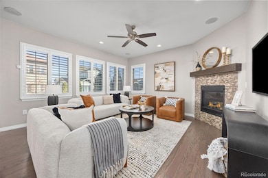 Family room with wall of windows.