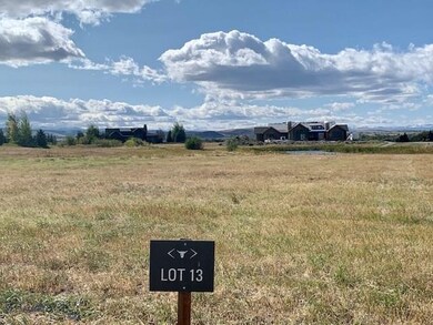 Large .6 acre lot with pond and open space beyond