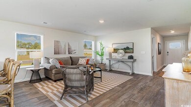 Living room featuring dark hardwood / wood-style f