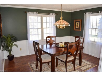 FORMAL DINING ROOM WITH FRESH PAINT.