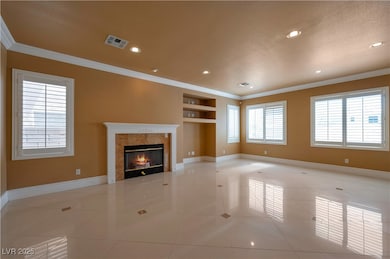 Unfurnished living room featuring built in feature
