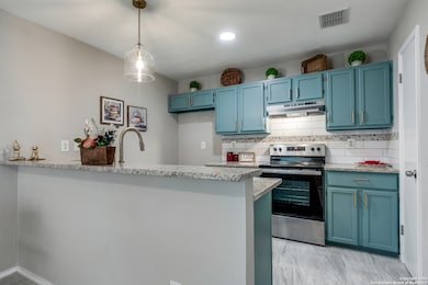 10052 Woodtrail, San Antonio, TX 78250 - photo 6