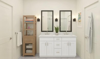 Primary bath features vanity with dual sinks