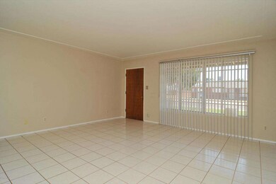 Living room with large window.