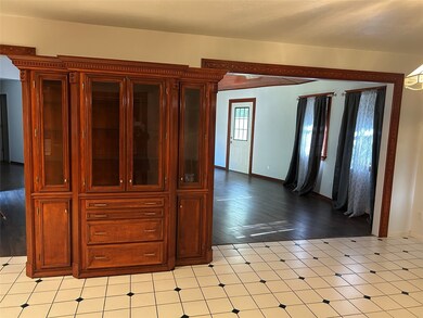 This lovely buffet- china hutch will stay.