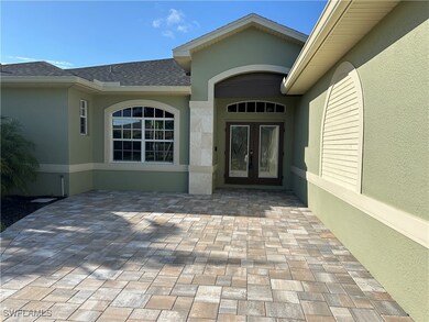 View of exterior entry featuring french doors, stu
