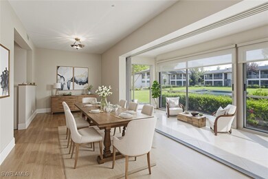 Virtually Staged Dining space featuring light wood finished floors and baseboards