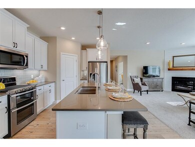 A wonderful center island.  MODEL HOME PHOTOS, COL