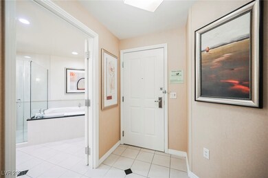 Entrance foyer featuring light tile patterned floo
