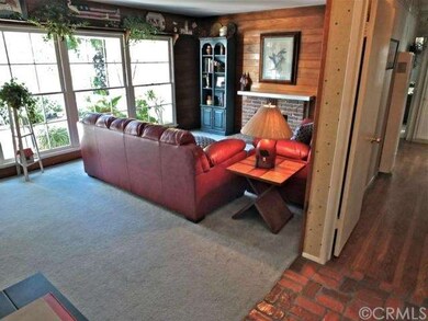 Enter the front door to the living room with large