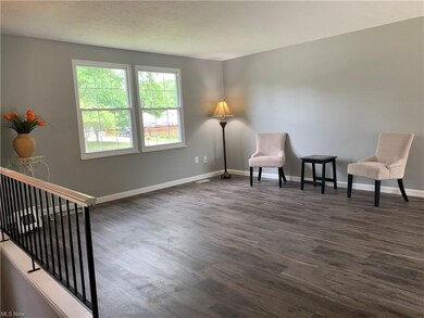 Lots of natural light fills the living room upstairs