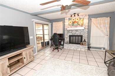 Tiled flooring is easy to clean, see the sliding glass doors