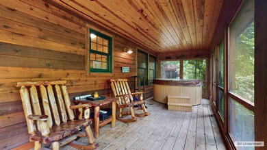 Screened porch with hot tub