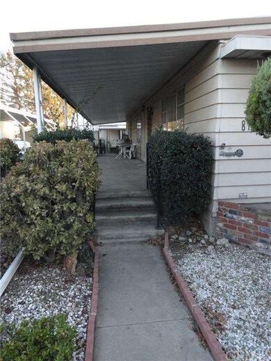 Steps to front porch and front door. 