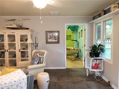You will love the shelving above the windows.  Per