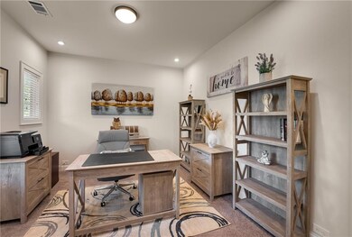Office featuring light colored carpet and recessed