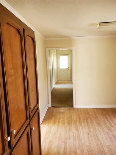 View of the kitchen down the hall.