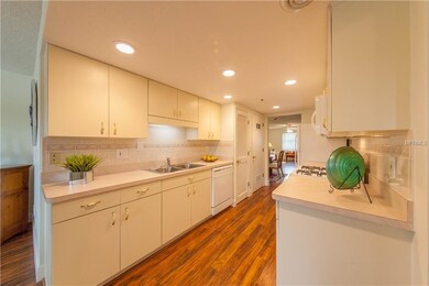 bright and spacious kitchen with closet pantry