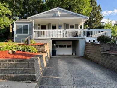 View of garage and front of the house