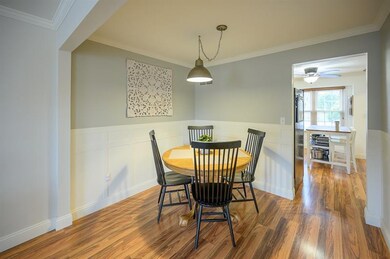 Cozy Dining Room with Elaborate Wainscoating!!
