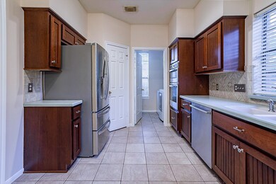 16927 Shady Square Ct, Houston, TX 77095 - photo 4