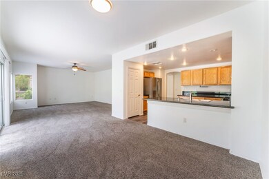 Unfurnished living room featuring dark colored car