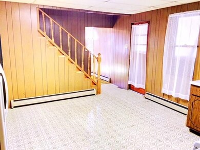 DOOR IN KITCHEN LEADS TO CLOSED-IN PORCH. YOU CAN 