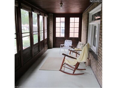 ENCLOSED FRONT PORCH