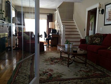 Living Room. Etched glass French door leads from e