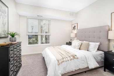 This spacious second bedroom offers comfort and convenience