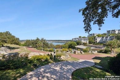 View of property's community with a water view