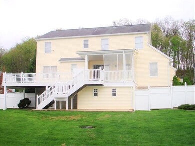 Enjoy the view of the large fenced backyard from t