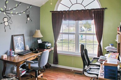 Down the hall to the left is a bedroom currently being used as an office