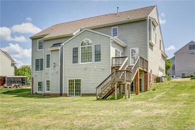 Rear Elevation.  Note the Walk Out Basement.  Large Back Yard