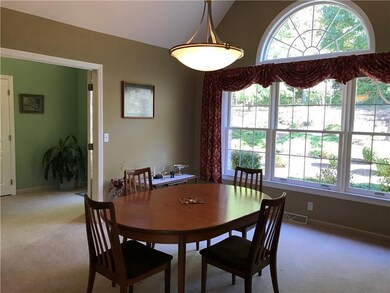 enter from double glass doors in entry or  from ki