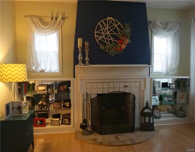 Formal Living Room with wood-burning fireplace