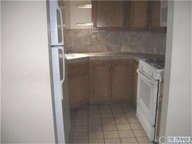 KITCHEN WITH TILE COUNTERS WITH BACKSPLASH & NEW P